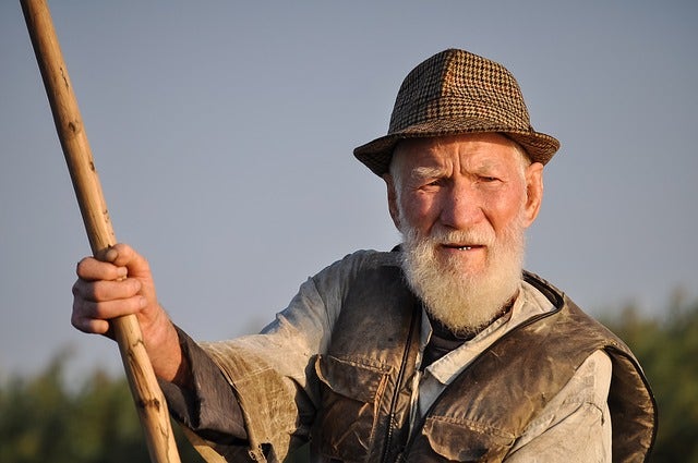 fisherman holding pole