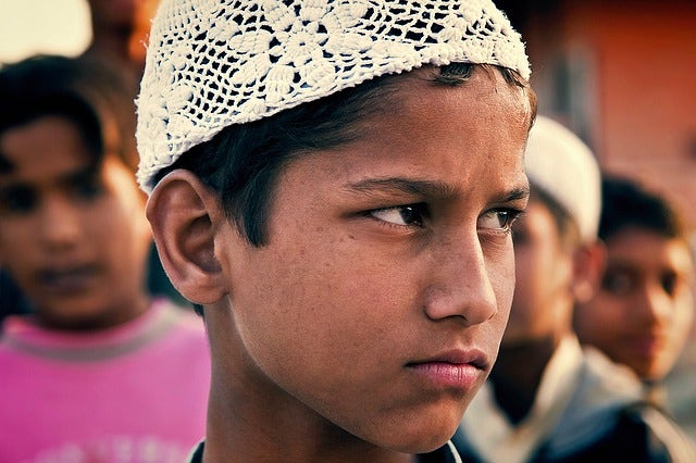 indian boy with frown