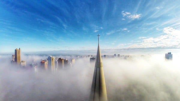 drone image above city in mist