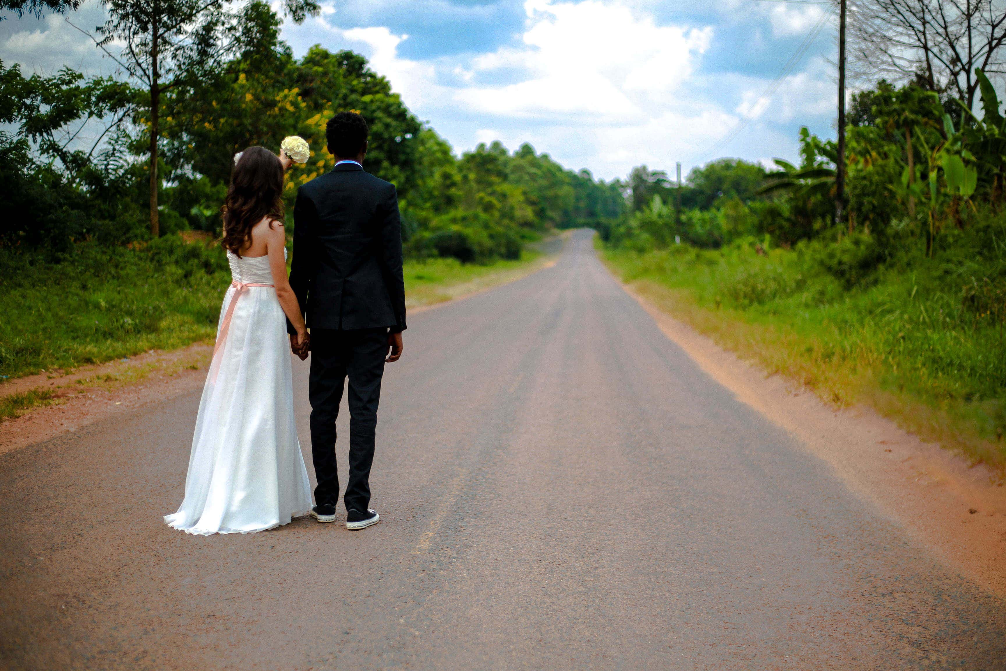 Newlyweds on a road
