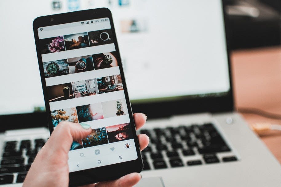 phone with social media photographs