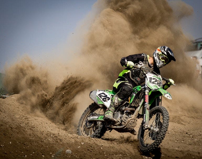 biker with sand behind