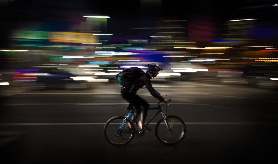 cyclist in panned sports photo