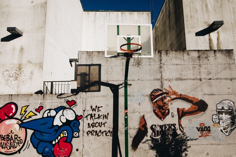 basket ball hoop in front of street art