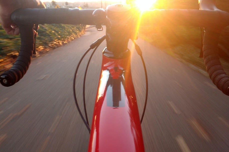 bike travelling along road